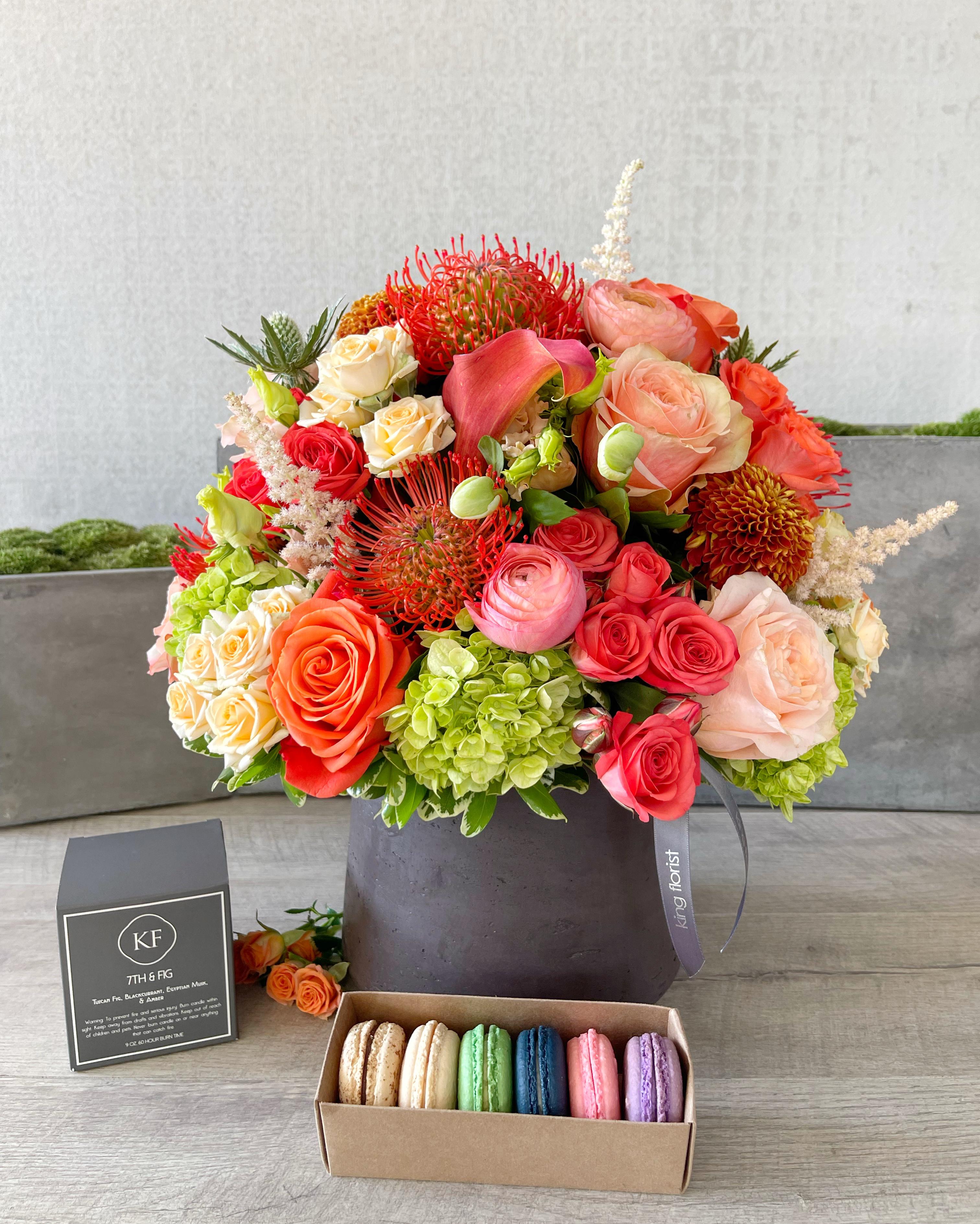 Floral Arrangements, Half Dozen Macarons, and Candle size, inches height and inches wide.