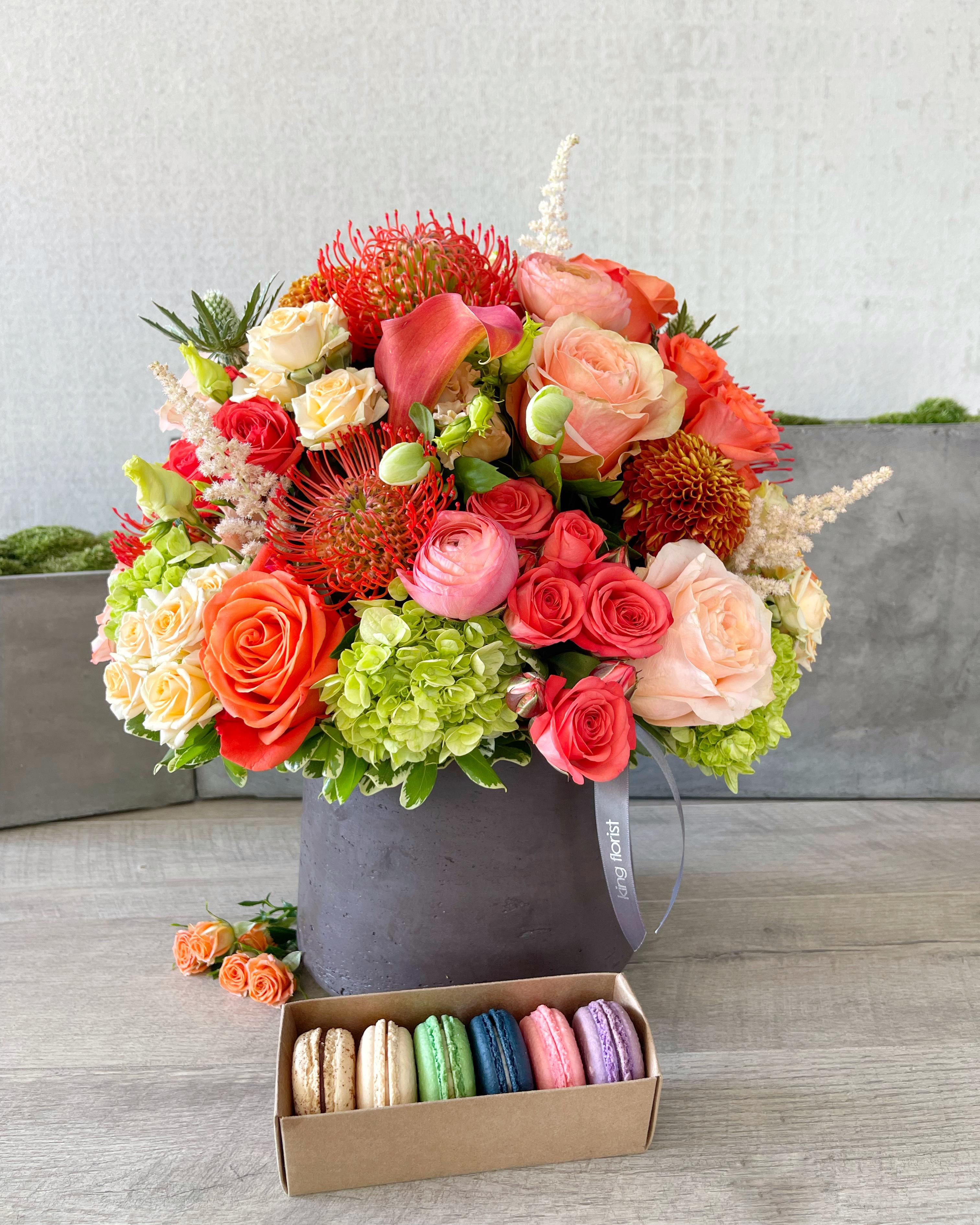 Floral Arrangement and Half Dozen Macarons size, inches height and inches wide.