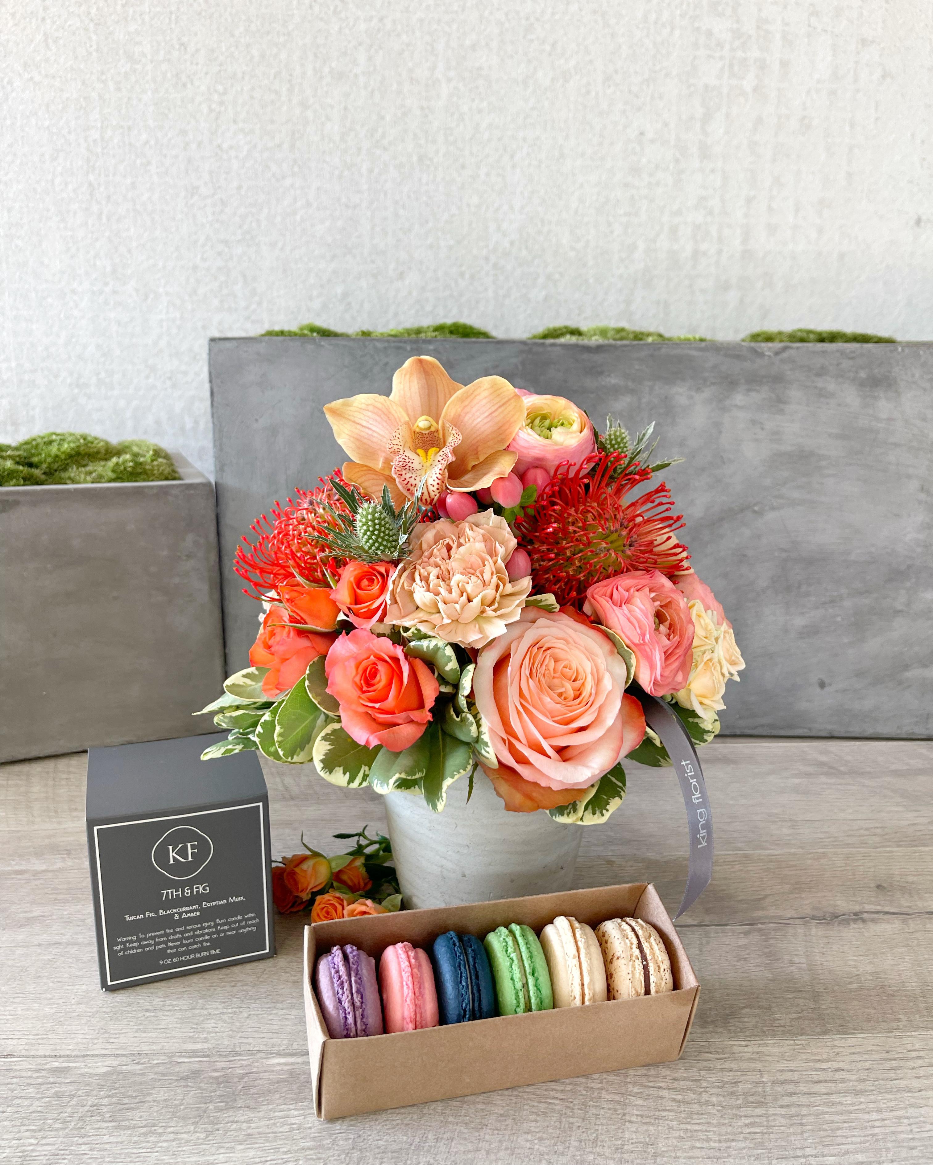Floral Arrangement, Half dozen Macarons, and Candle size, inches height and inches wide.