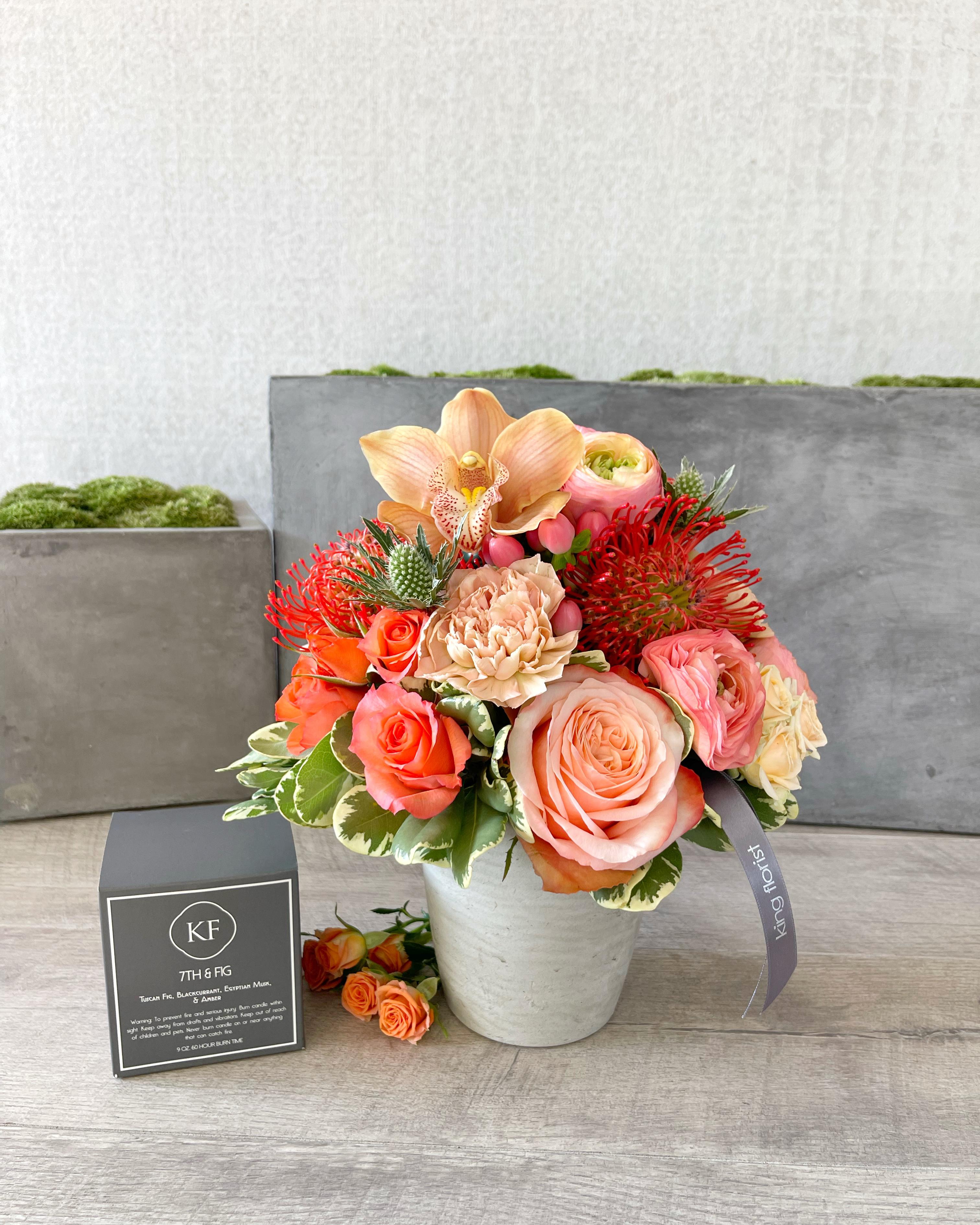 Floral Arrangement and Candle size, inches height and inches wide.