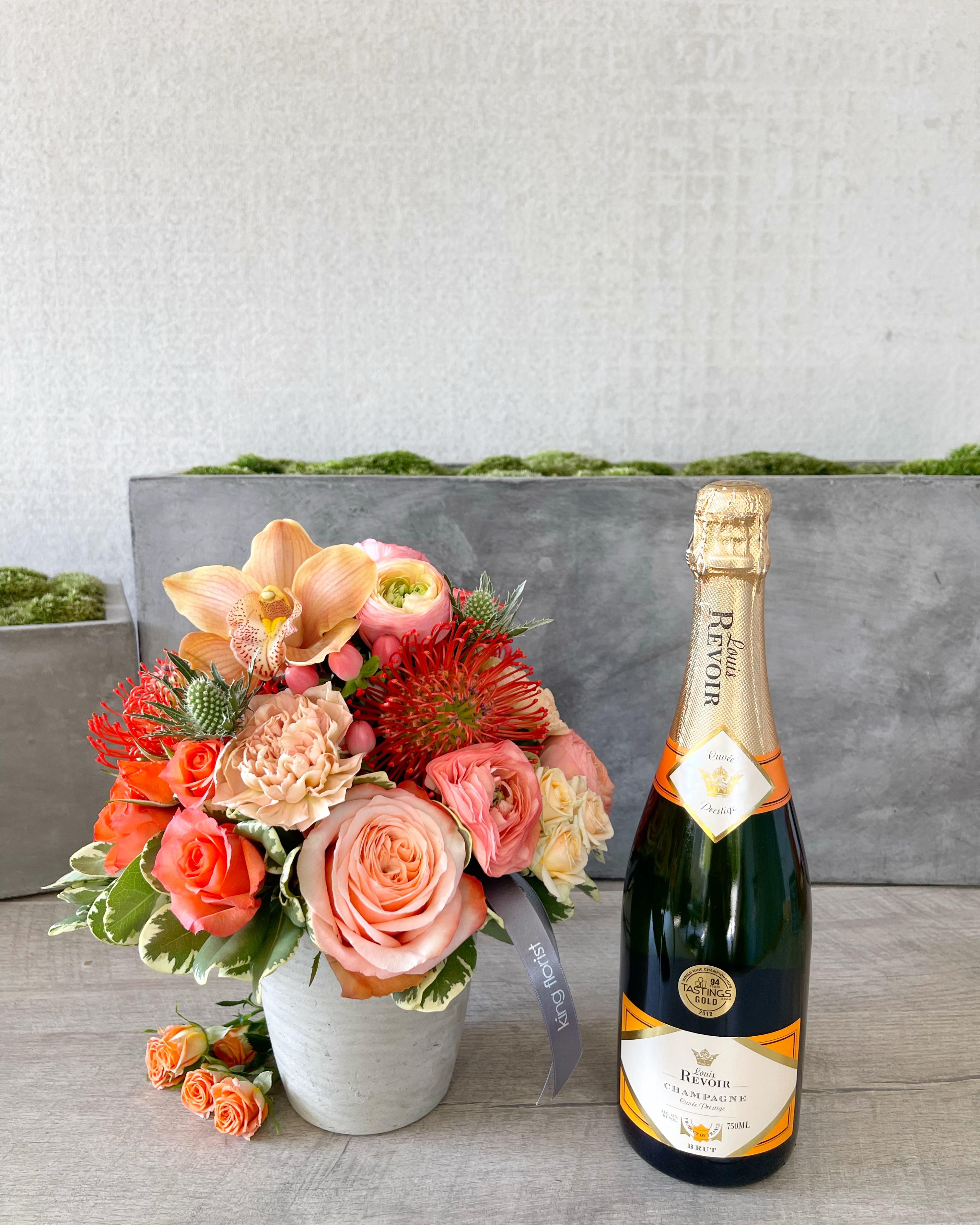 Floral Arrangement and Champagne size, inches height and inches wide.