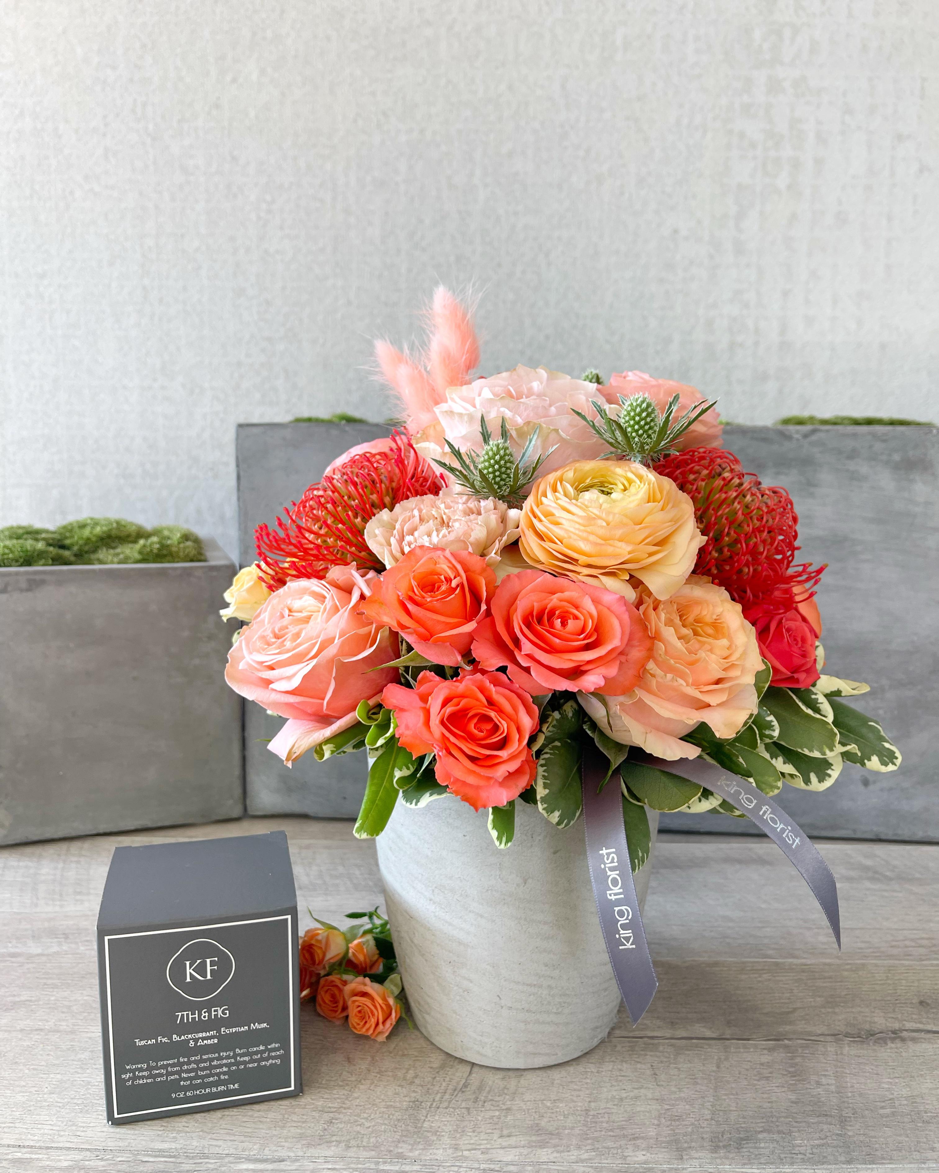 Floral Arrangement and Candle size, inches height and inches wide.