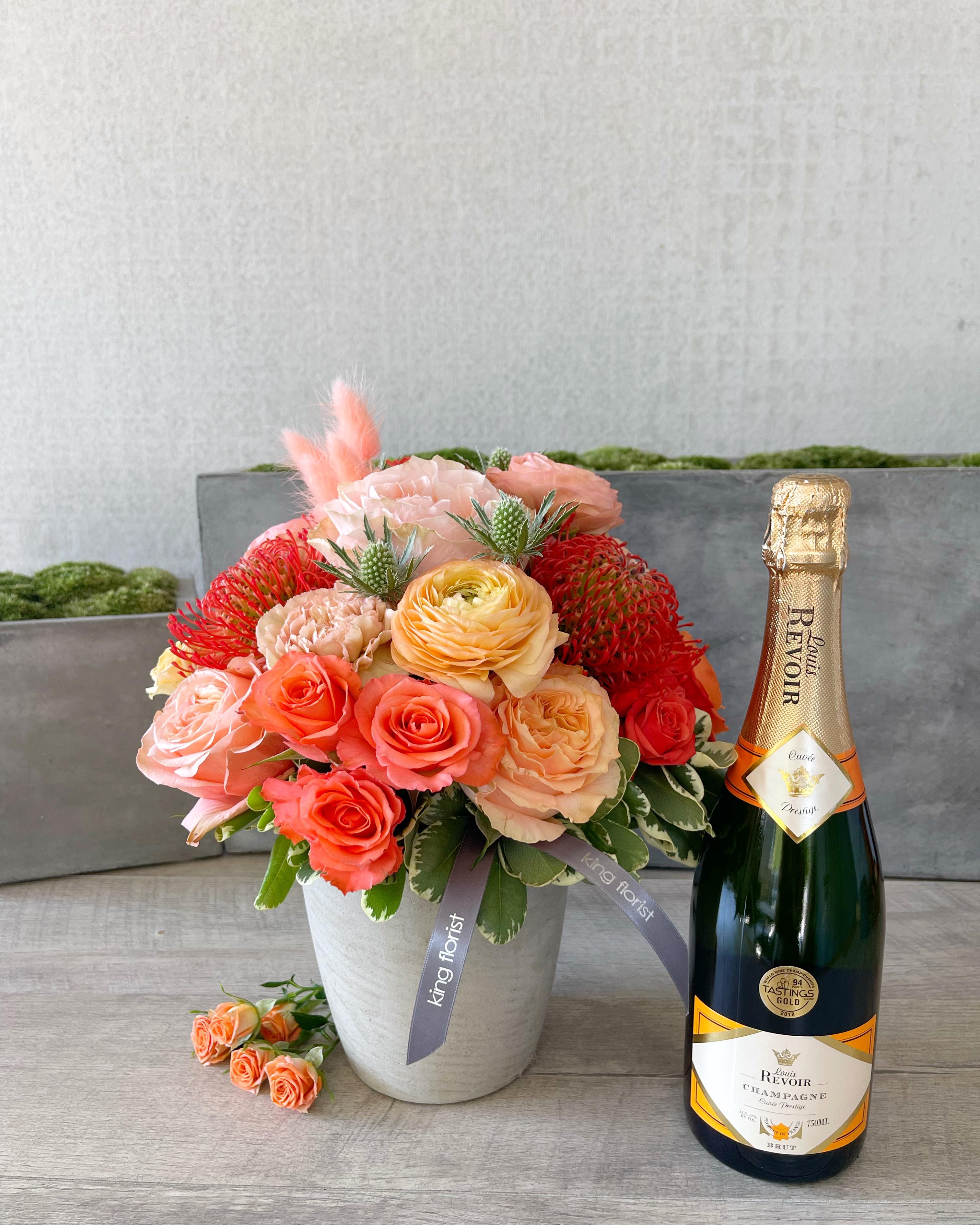 Floral Arrangement and Champagne size, inches height and inches wide.