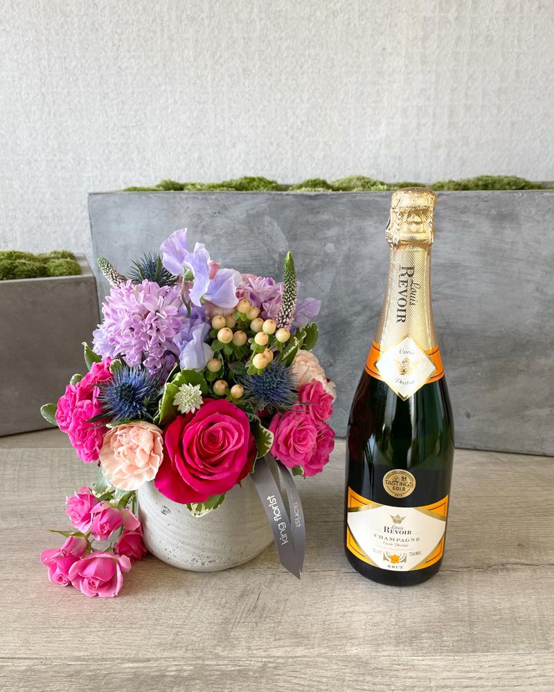 Floral Arrangement and Champagne size, inches height and inches wide.