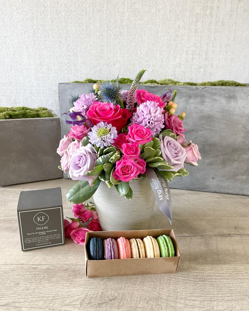Floral Arrangement, Half Dozen Macarons and a Candle size, inches height and inches wide.