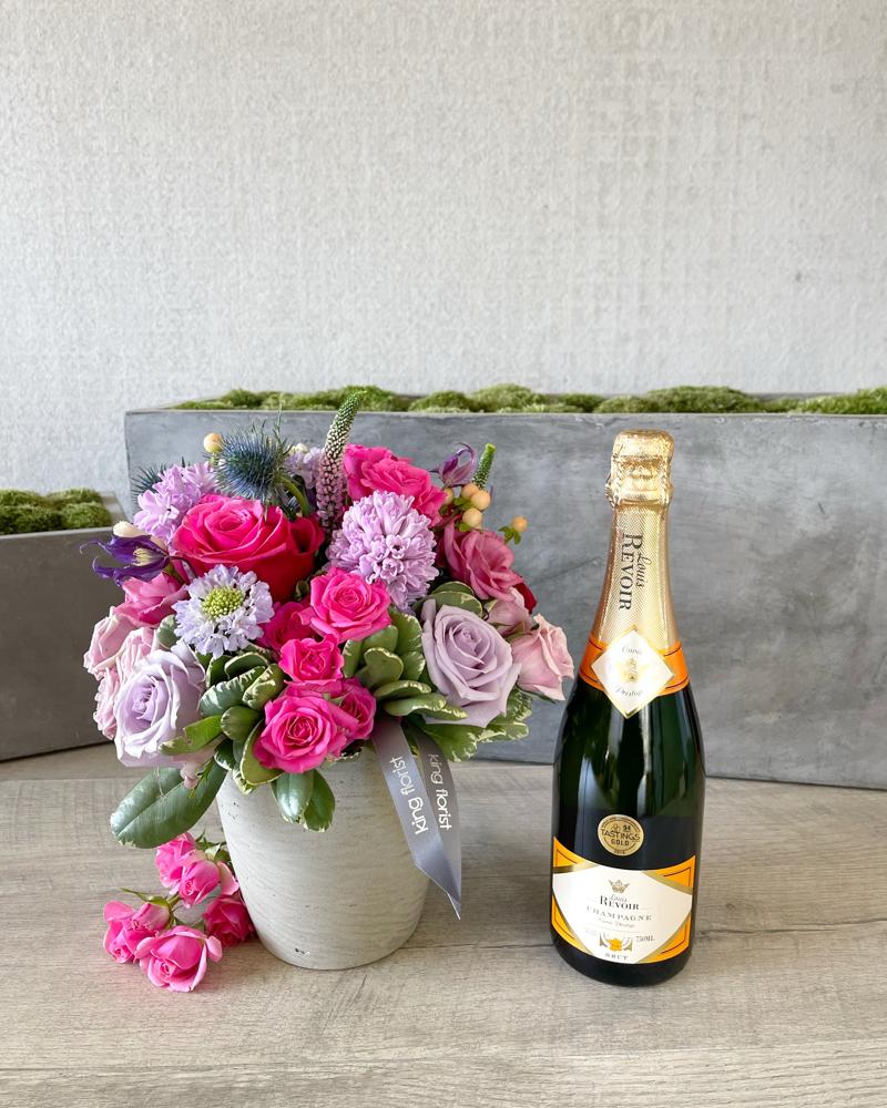 Floral Arrangement and Champagne size, inches height and inches wide.
