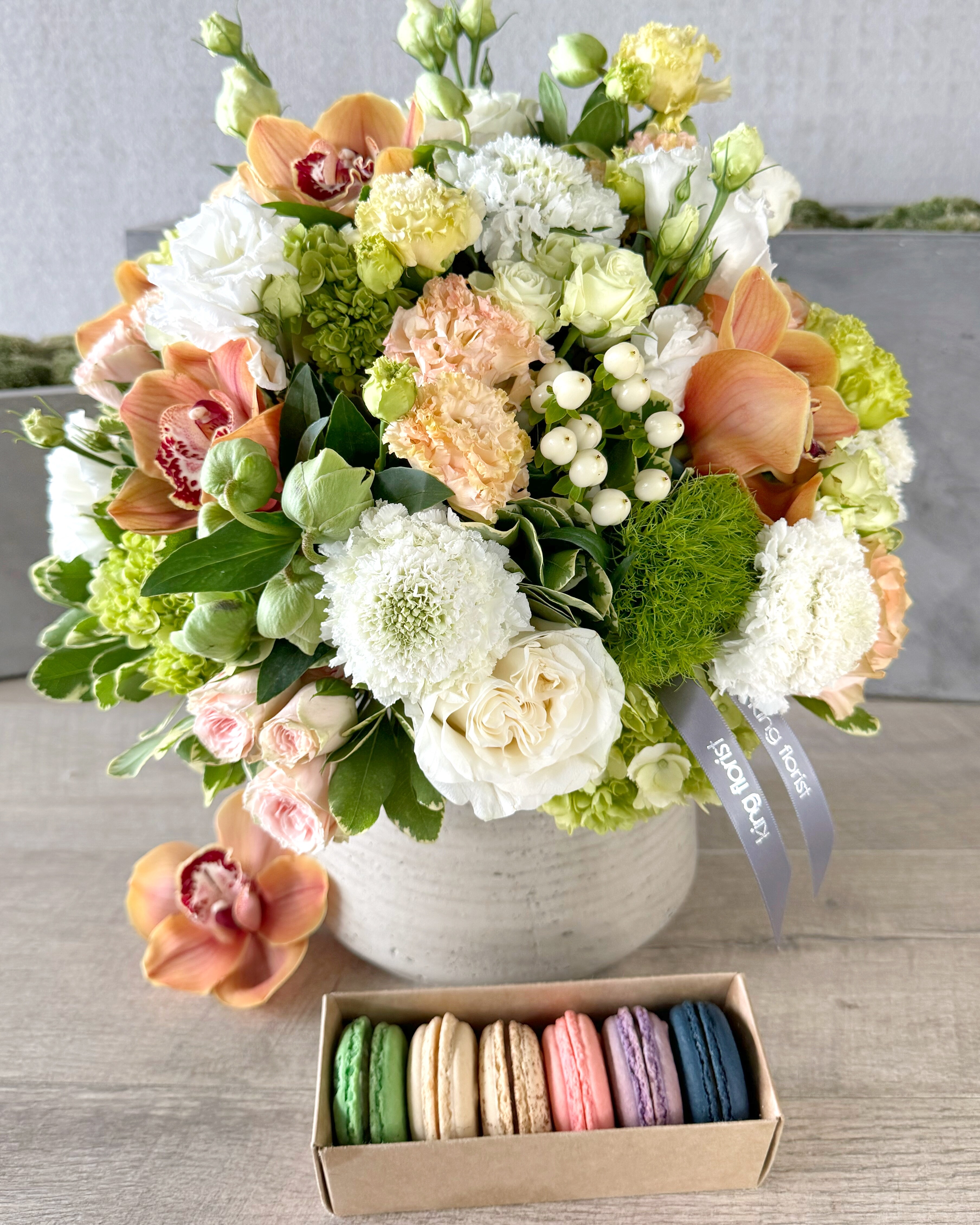 Floral Arrangement and Half Dozen Macarons size, inches height and inches wide.