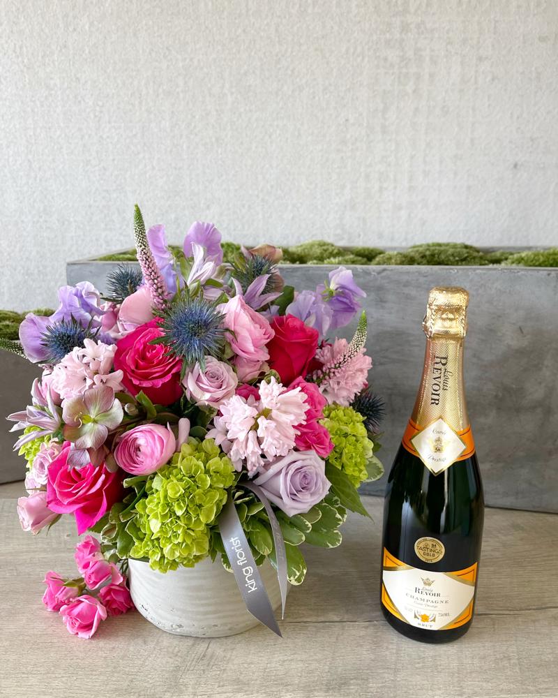 Floral Arrangement and Champagne size, inches height and inches wide.