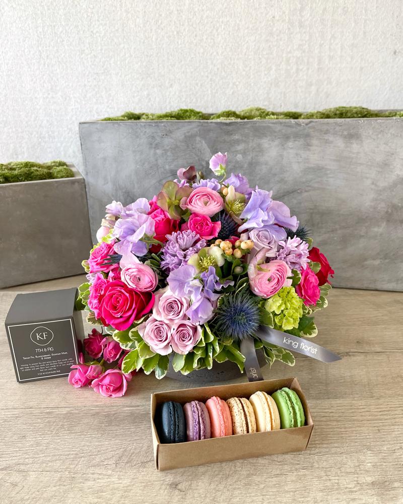 Floral Arrangement, Half Dozen Macarons and a Candle size, inches height and inches wide.