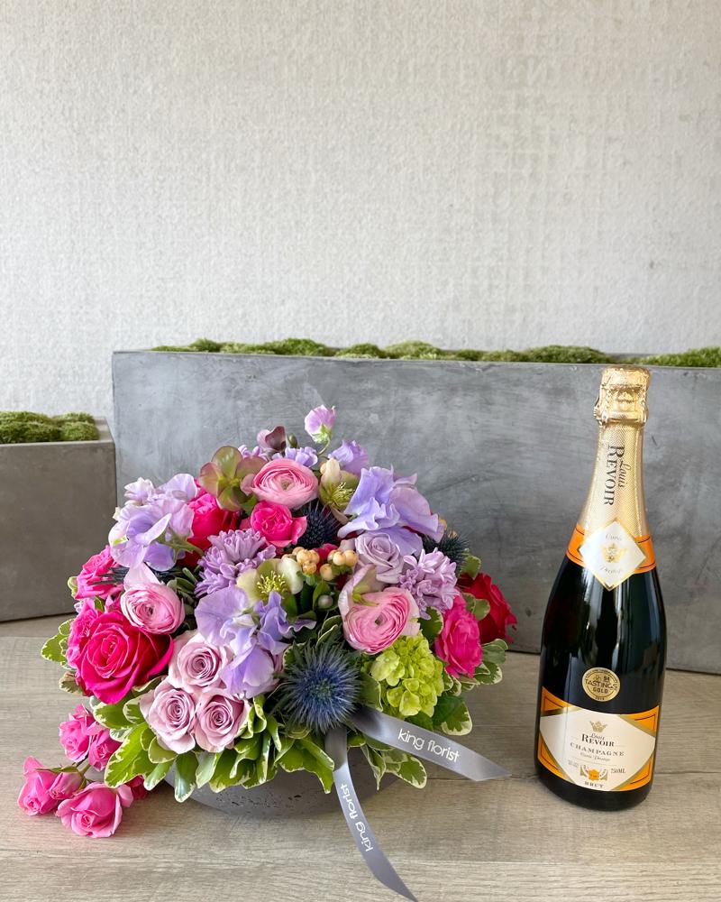Floral Arrangement and Champagne size, inches height and inches wide.