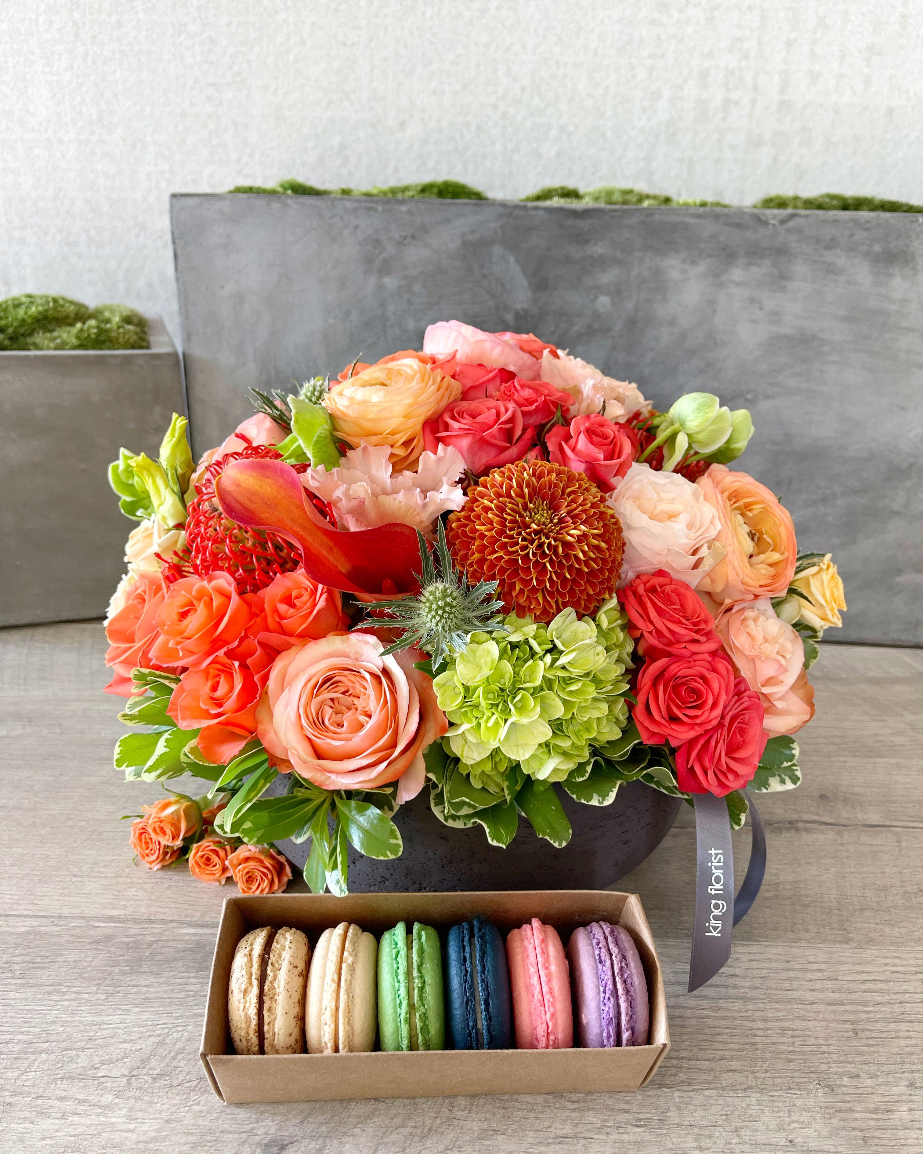 Floral Arrangement and Half Dozen Macarons size, inches height and inches wide.