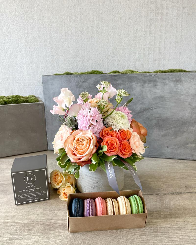 Floral Arrangement, Half dozen Macarons, and Candle size, inches height and inches wide.