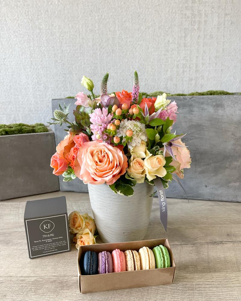 Floral Arrangement, Half dozen Macarons, and Candle size, inches height and inches wide.