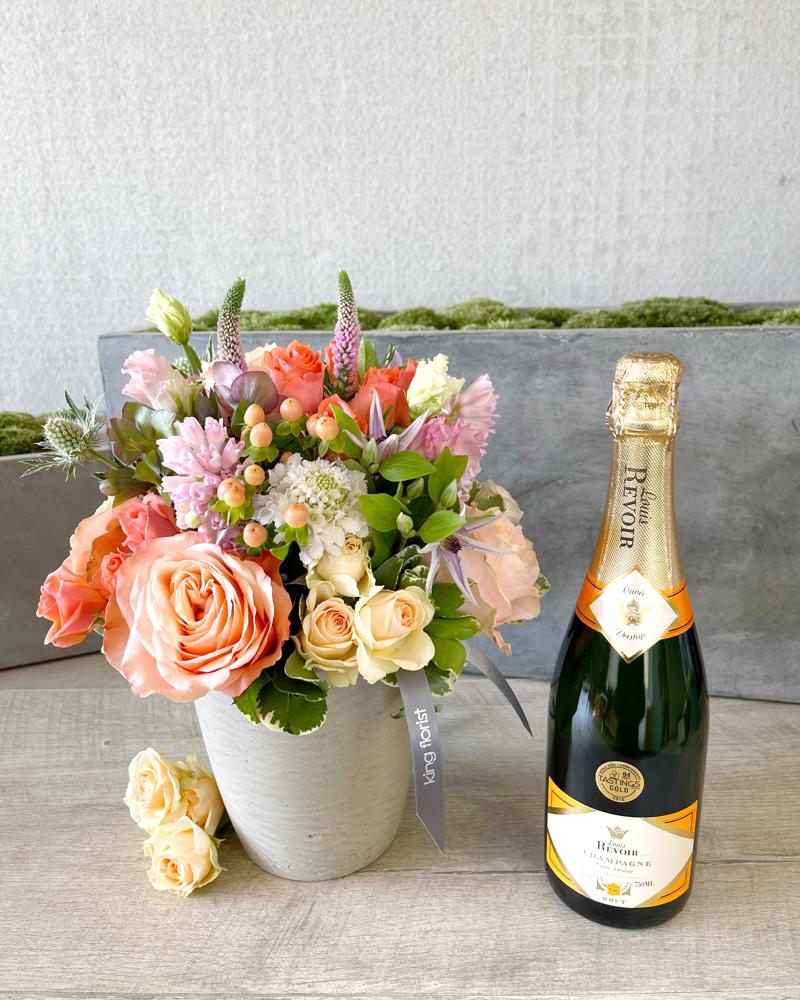 Floral Arrangement and Champagne size, inches height and inches wide.