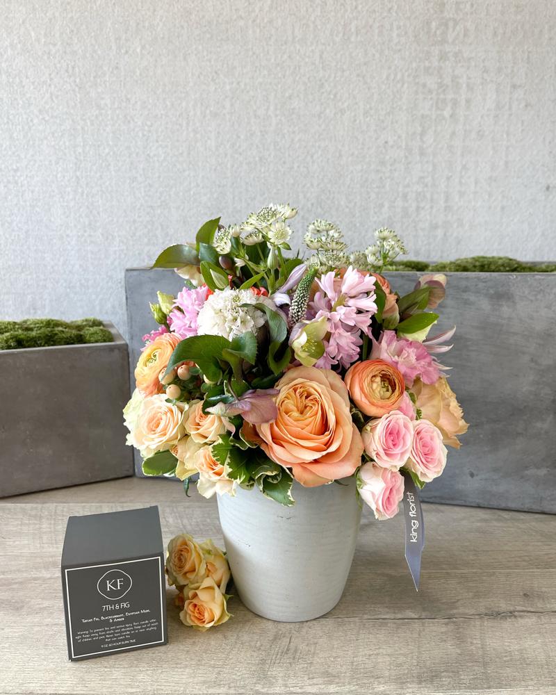Floral Arrangement and Candle size, inches height and inches wide.