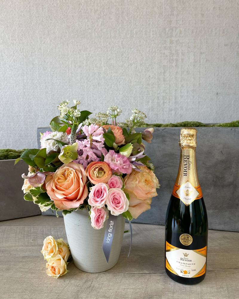 Floral Arrangement and Champagne size, inches height and inches wide.