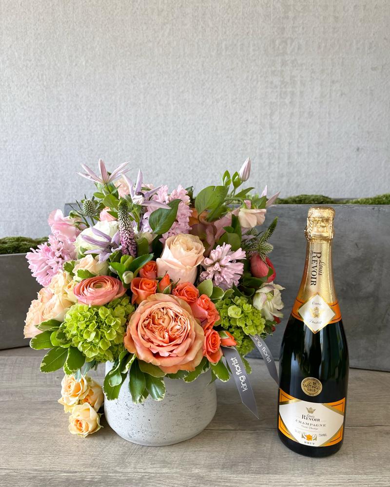 Floral Arrangement and Champagne size, inches height and inches wide.