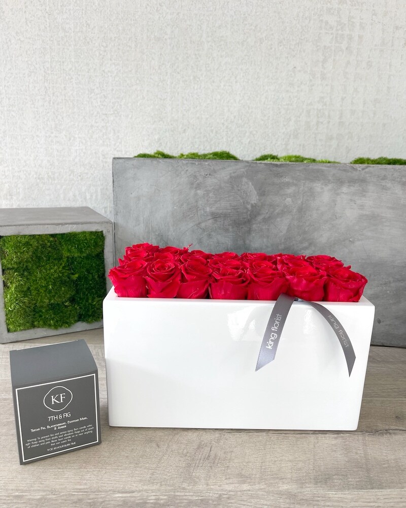 Floral Arrangement and a Candle size, inches height and inches wide.