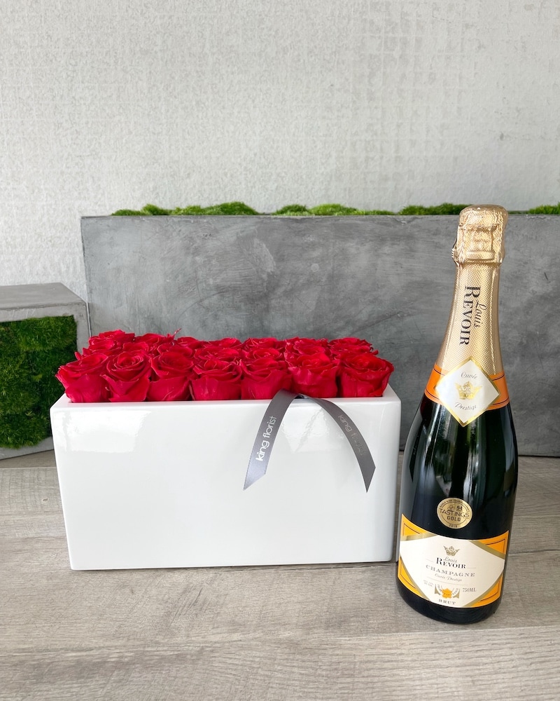 Floral Arrangement and Champagne size, inches height and inches wide.