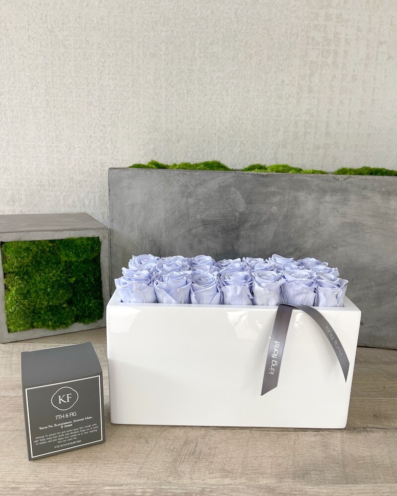 Floral Arrangement and a Candle size, inches height and inches wide.