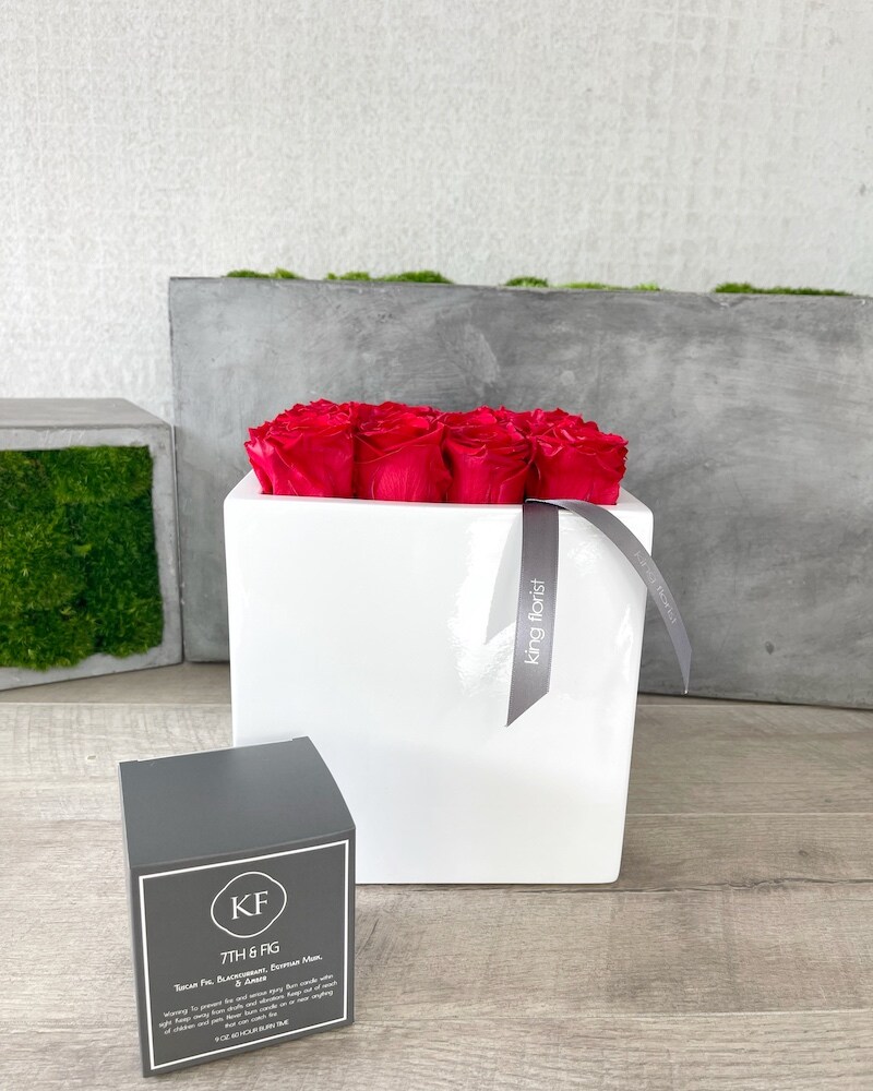 Floral Arrangement and a Candle size, inches height and inches wide.