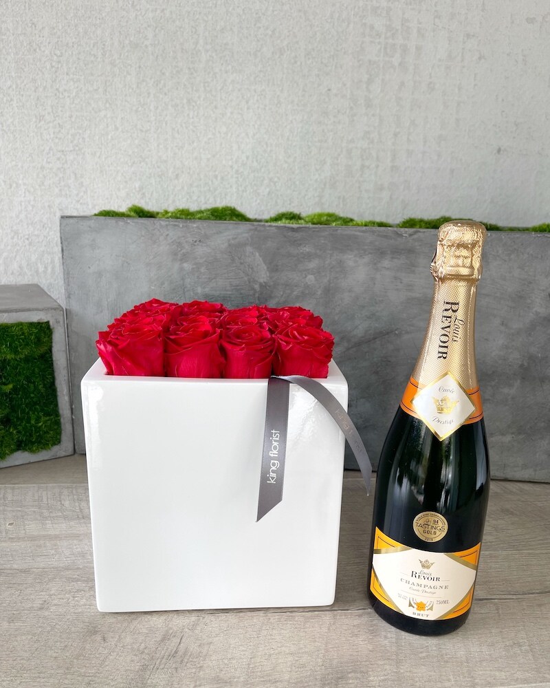 Floral Arrangement and Champagne size, inches height and inches wide.