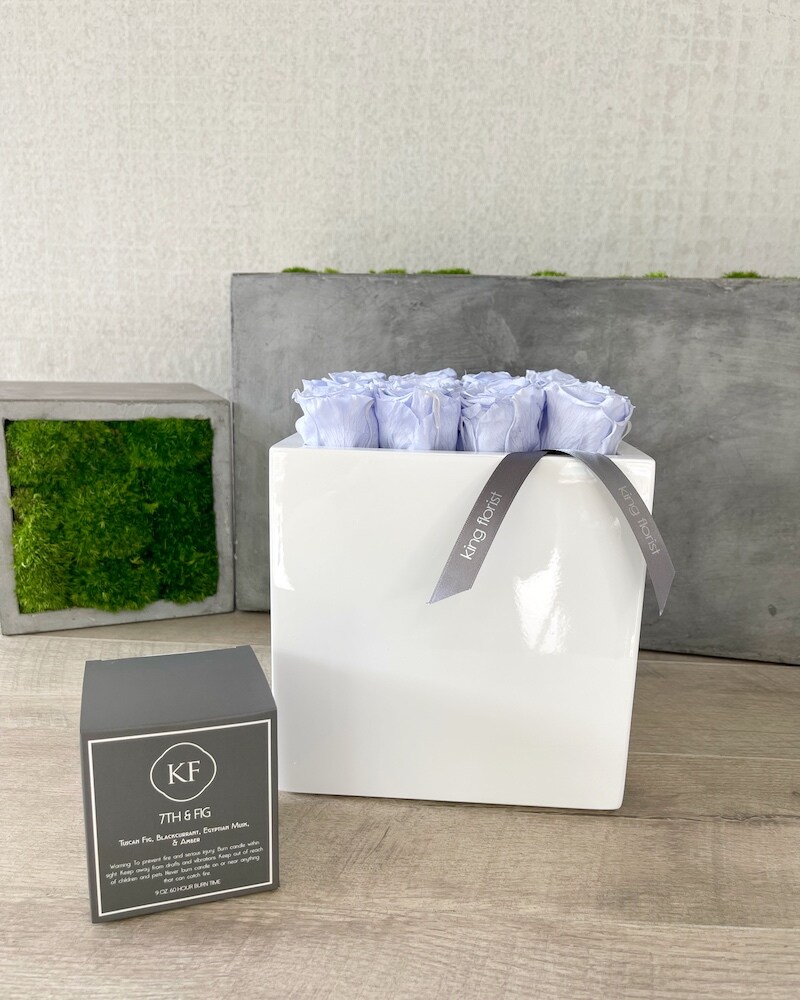 Floral Arrangement and a Candle size, inches height and inches wide.