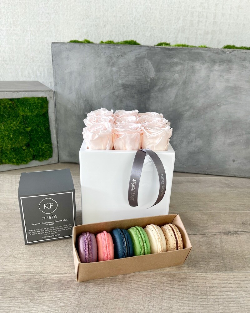 Floral Arrangement, Half Dozen Macarons and a Candle size, inches height and inches wide.