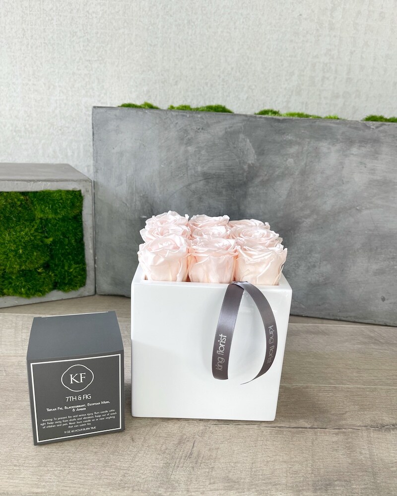 Floral Arrangement and a Candle size, inches height and inches wide.