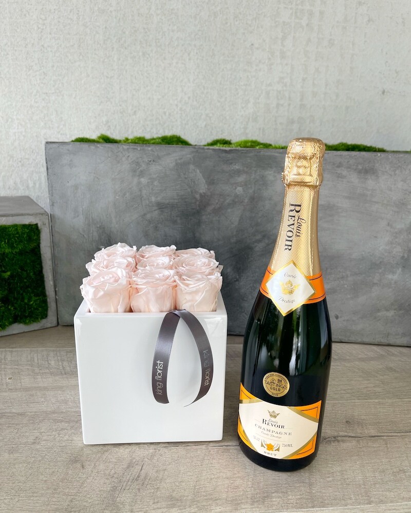 Floral Arrangement and Champagne size, inches height and inches wide.