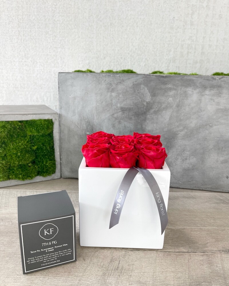 Floral Arrangement and a Candle size, inches height and inches wide.