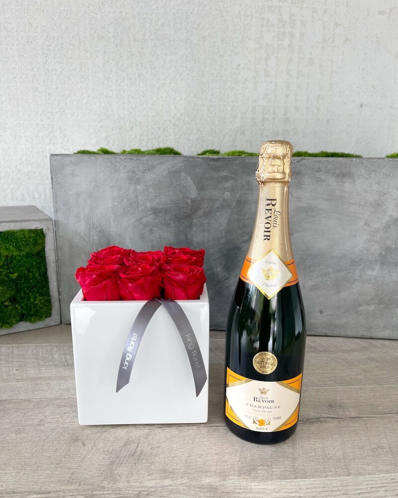 Floral Arrangement and Champagne size, inches height and inches wide.