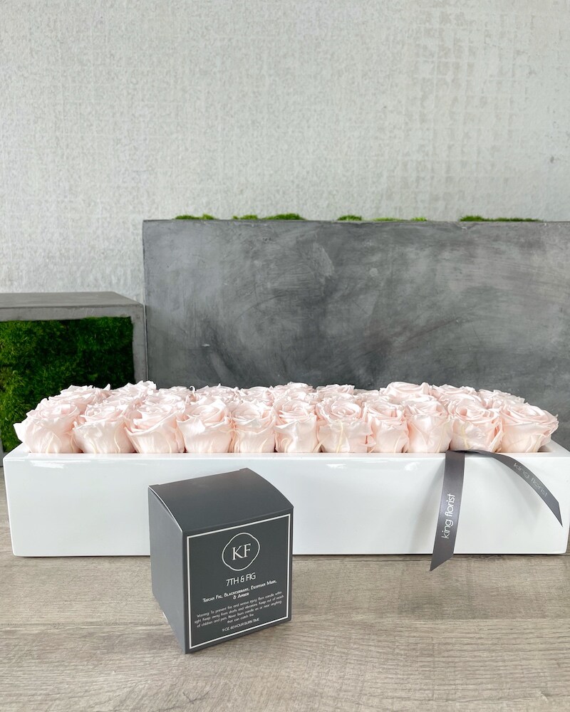 Floral Arrangement and a Candle size, inches height and inches wide.
