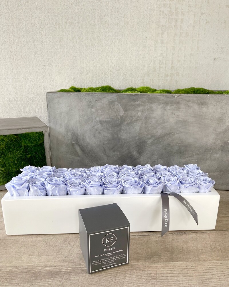 Floral Arrangement and a Candle size, inches height and inches wide.
