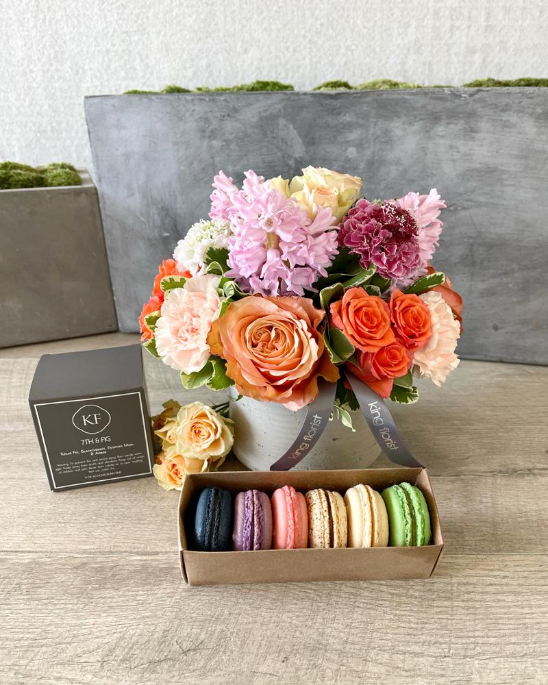 Floral Arrangement, Half dozen Macarons, and Candle size, inches height and inches wide.