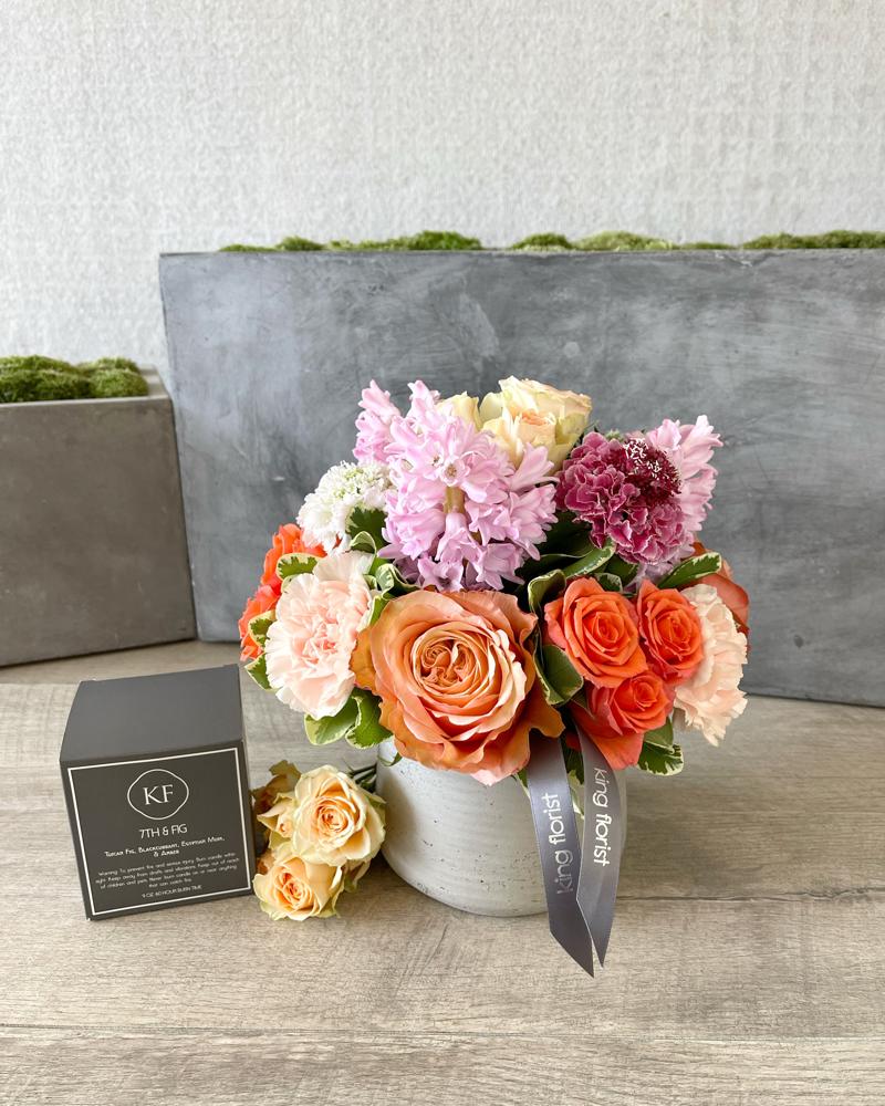 Floral Arrangement and Candle size, inches height and inches wide.