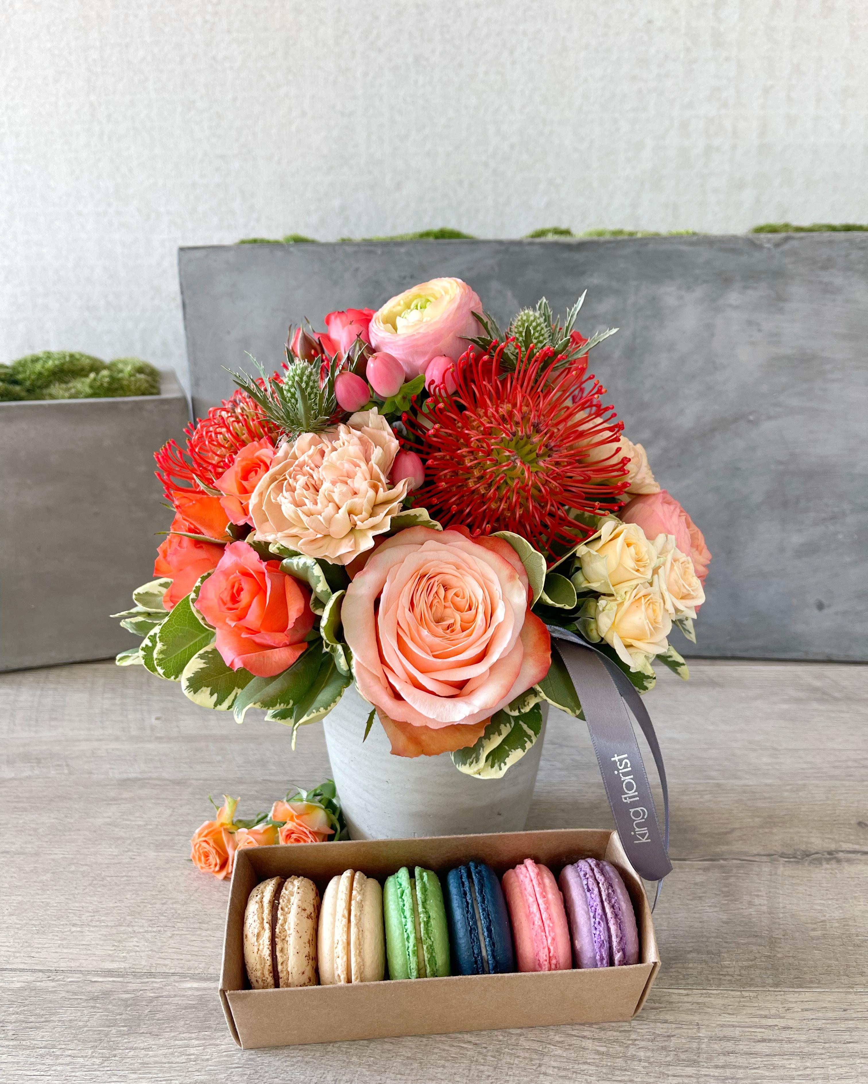 Floral Arrangement and Half Dozen Macarons size, inches height and inches wide.