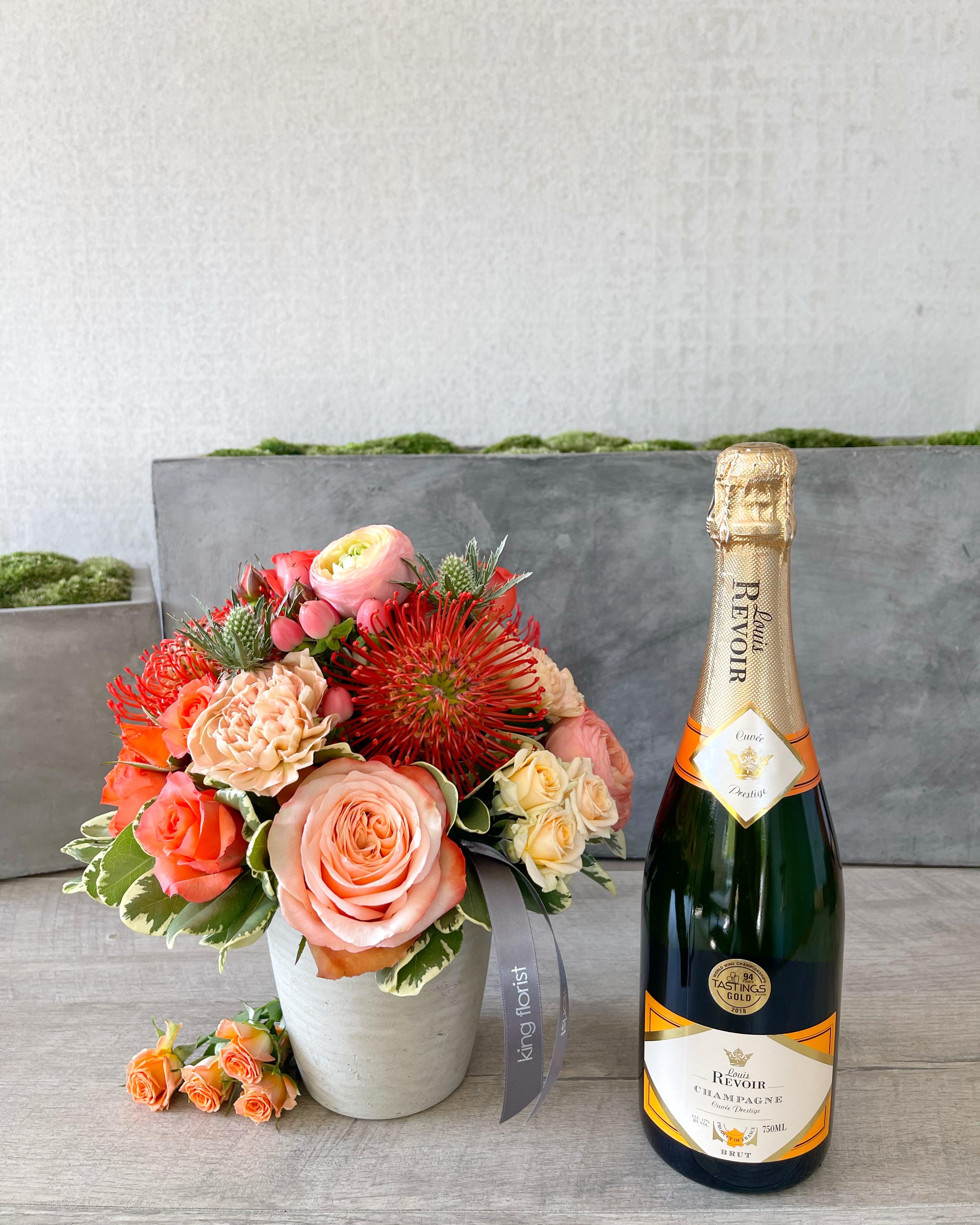 Floral Arrangement and Champagne size, inches height and inches wide.