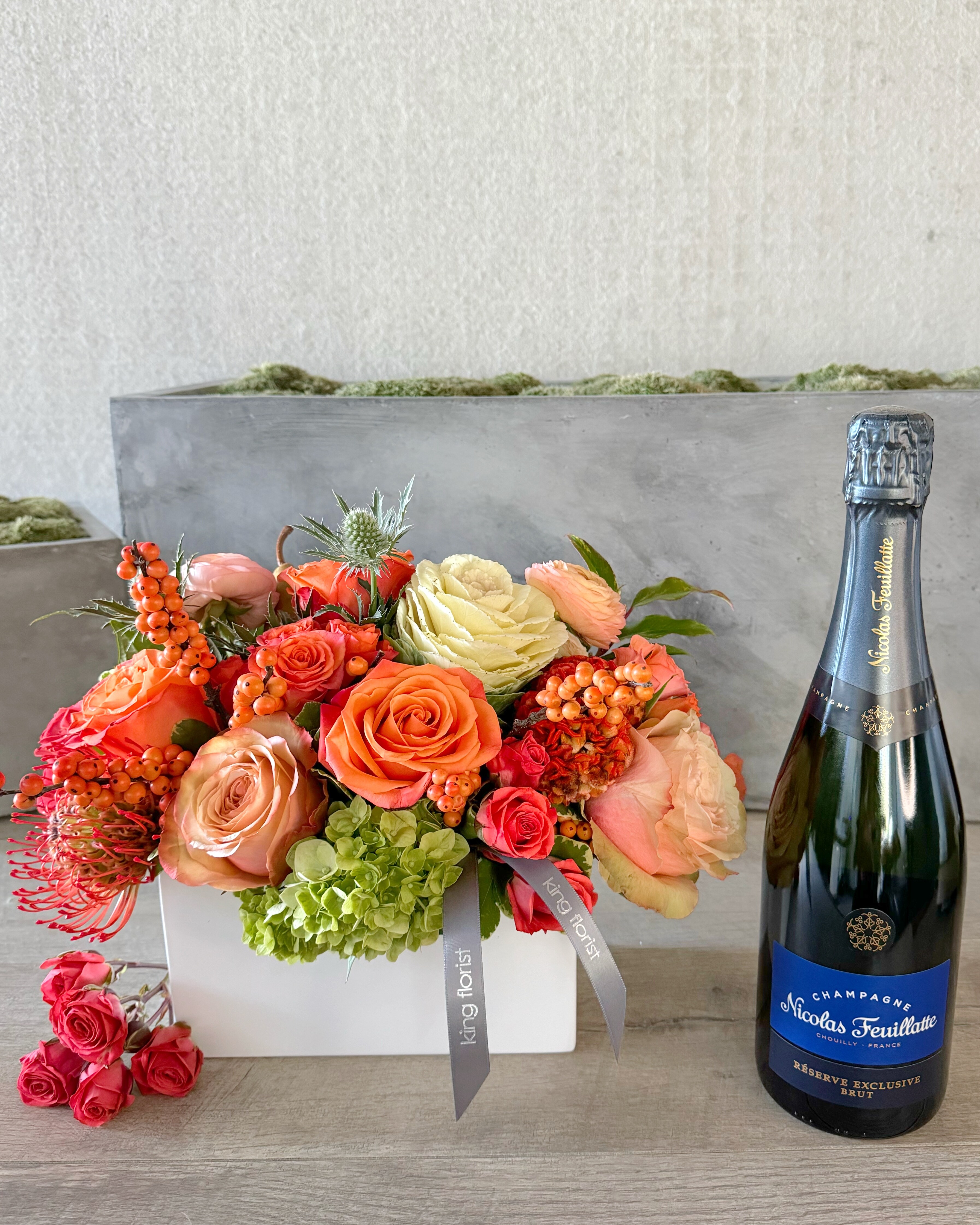 Floral Arrangement and Champagne size, inches height and inches wide.
