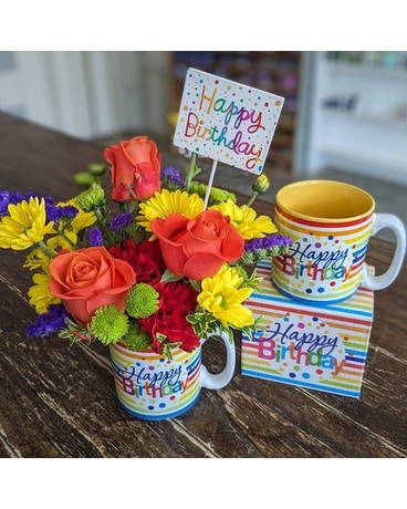 Mug with flowers size, inches height and inches wide.
