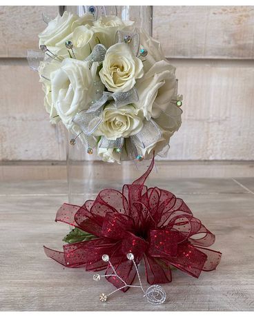 Corsage with clear rhinestones size, inches height and inches wide.