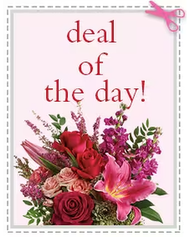 Deluxe Arranged in Vase size, inches height and inches wide.