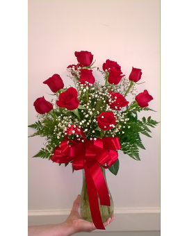 Deluxe 18 roses size, inches height and inches wide.