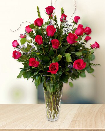 Two Dozen Roses + 3 Stargazer Lilies size, inches height and inches wide.