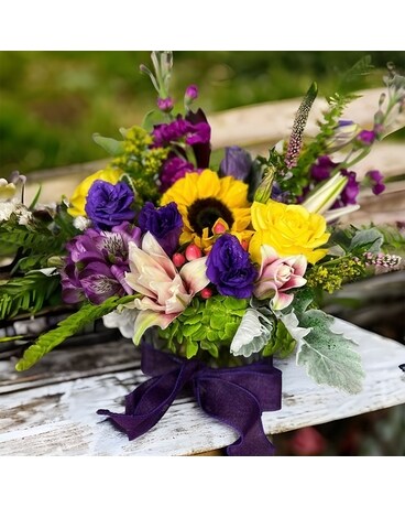 Purple and yellow  Designer's Choice Flower Arrangement