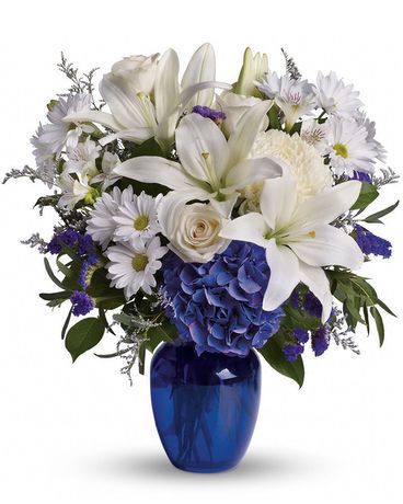 Deluxe size, 19 inches height and 17.5 inches wide.