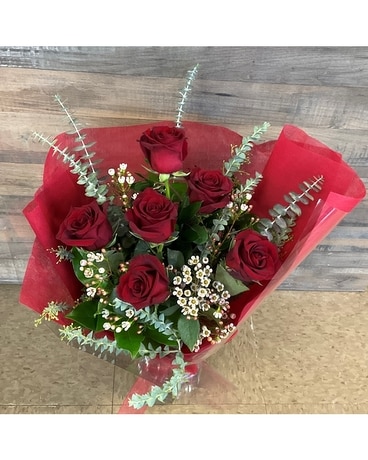 6 Red Roses (greens + fill flower + wrapped) size, inches height and inches wide.