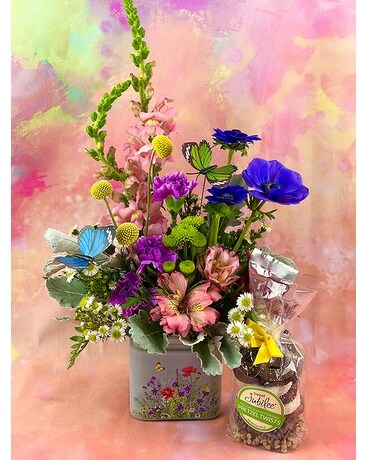 Arrangement w/ chocolate covered pretzels size, inches height and inches wide.