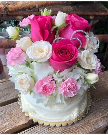 Deluxe with more flowers size, inches height and inches wide.