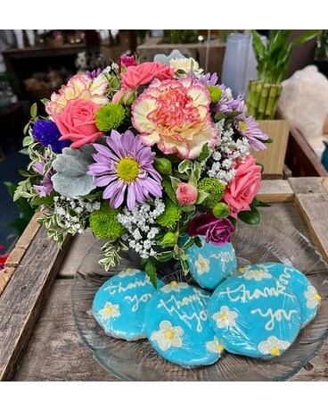 Deluxe with flowers in a vase size, inches height and inches wide.
